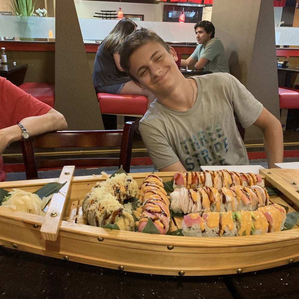 Tokyo Asia Fusion - We ordered 5 sushi rolls and they presented it on the cute boat! Loved our waiters! - Sushi Bars Near Me - Abilene, Texas