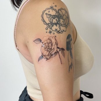 MODO Ink Tattoo - Kimi's camellia design! - Tattoo Near Me - Orange, California MODO Ink Tattoo - Kimi's camellia design! - Tattoo Near Me - Orange, California