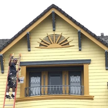 Ike's Painting - Crew working hard painting the 40 ft high knee braces! - Painters Near Me - Burbank, California