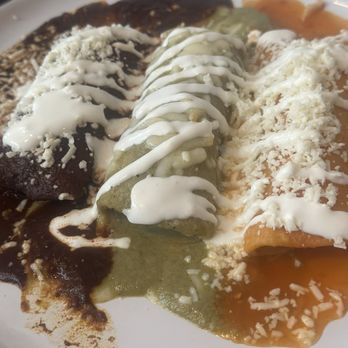 Consuelo - These were triple enchiladas I believe we're black bean Verde and red sauce, meaty, flavorful, delicious - Mexican Near Me - Gainesville, Georgia Consuelo - These were triple enchiladas I believe we're black bean Verde and red sauce, meaty, flavorful, delicious - Mexican Near Me - Gainesville, Georgia