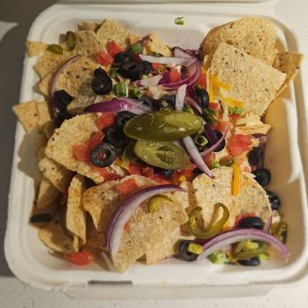 McAlister's Deli - My to-go order of Ultimate Nachos (chili/cheese and sour cream not pictured) - Delis Near Me - Carmel, Indiana McAlister's Deli - My to-go order of Ultimate Nachos (chili/cheese and sour cream not pictured) - Delis Near Me - Carmel, Indiana