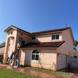 Elite LawnCare Service - Pressure cleaning the roof.