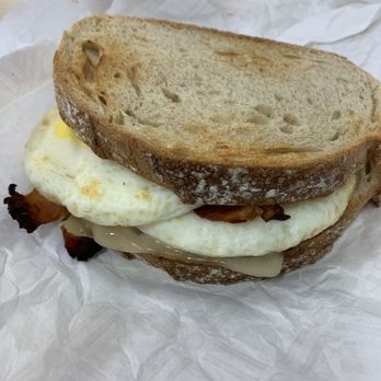 Dunkin' - a breakfast sandwich on a piece of paper - Coffee & Tea Near Me - Secaucus, New Jersey Dunkin' - a breakfast sandwich on a piece of paper - Coffee & Tea Near Me - Secaucus, New Jersey