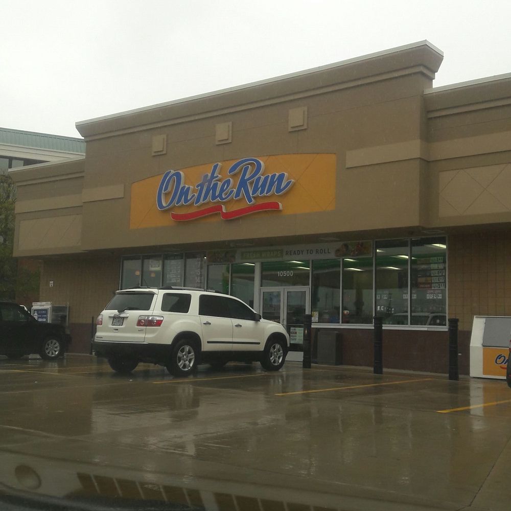 On The Run - a car parked in front of a store - Convenience Stores Near Me - Edmundson, Missouri