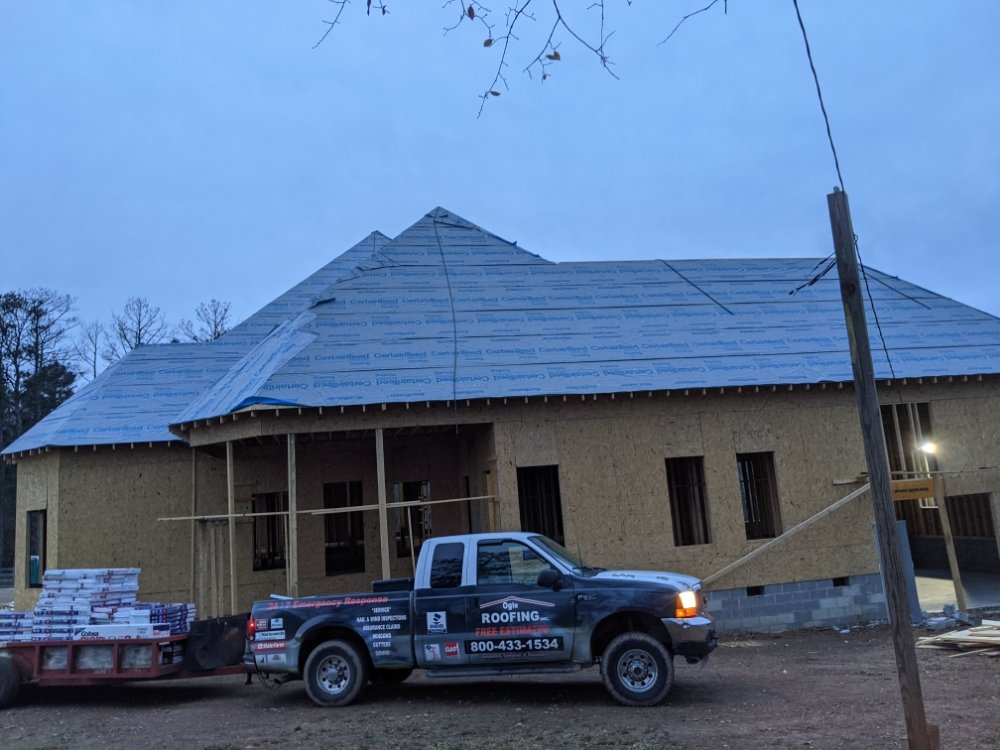 Slide of Ogle Roofing