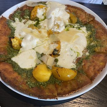 Tavern in the Square - Tomato and buratta pizza on cauliflower crust - New American Near Me - Wrentham, Massachusetts Tavern in the Square - Tomato and buratta pizza on cauliflower crust - New American Near Me - Wrentham, Massachusetts
