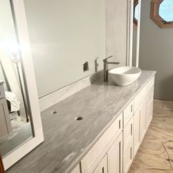 Twin City Discount Granite - Full length of countertop on vanity side with one sink just for measure measurement.