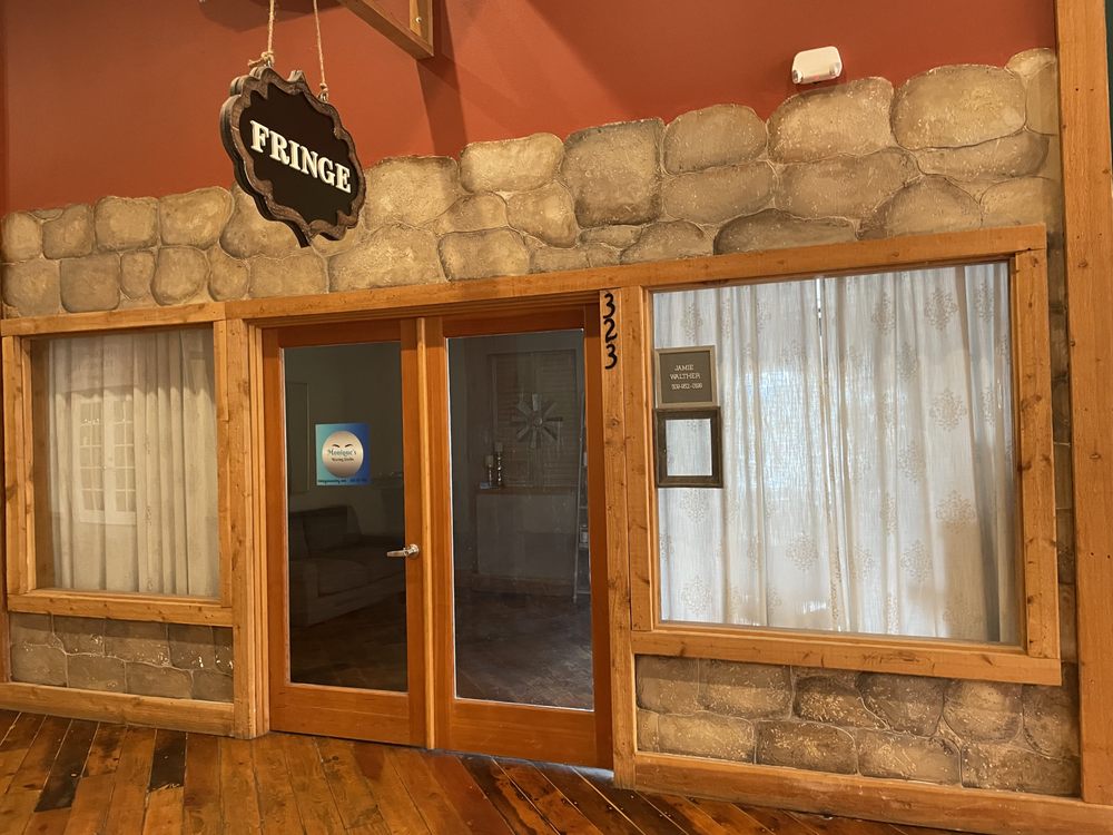 Monique’s Waxing Studio Logo