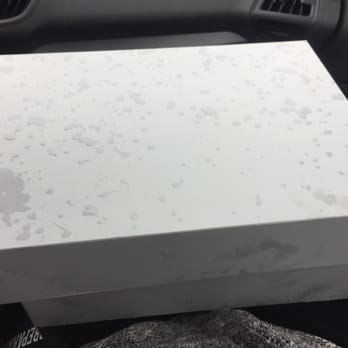 Cafe Beignet - To go boxes holding the yummy goodness! (ps it was raining outside!) - Cafes Near Me - Orange Beach, Alabama Cafe Beignet - To go boxes holding the yummy goodness! (ps it was raining outside!) - Cafes Near Me - Orange Beach, Alabama