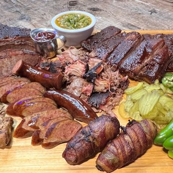 The Tin Cup Tavern - A variety of meats from our smoker. Brisket, Pulled Pork, Sausage, Tender Pork Ribs and smoked chicken. - Bars Near Me - Campbell, Texas The Tin Cup Tavern - A variety of meats from our smoker. Brisket, Pulled Pork, Sausage, Tender Pork Ribs and smoked chicken. - Bars Near Me - Campbell, Texas