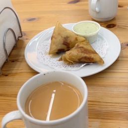 Chai, qeema samosas, raita Chai, qeema samosas, raita