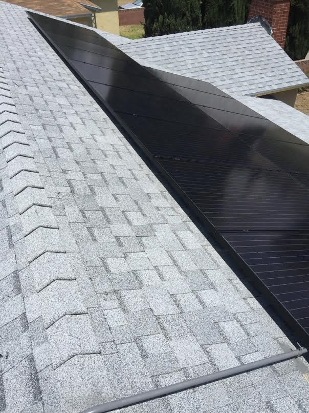 Slide of Hector's Roofing