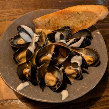 Confisco Grille & Backwater Bar - Coconut Curry Mussels - Bars Near Me - Orlando, Florida Confisco Grille & Backwater Bar - Coconut Curry Mussels - Bars Near Me - Orlando, Florida