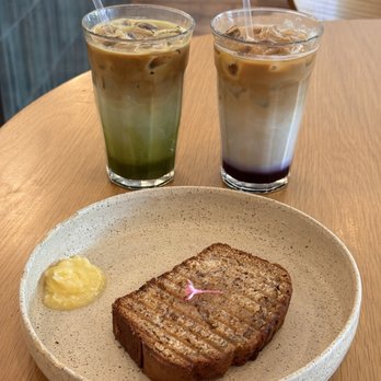Surf Camp Coffee - Iced Matcha Latte with double espresso shots and Iced Blueberry Latte Grilled Banana Bread with Lilikoi Butter - Coffee & Tea Near Me - East Honolulu, Hawaii Surf Camp Coffee - Iced Matcha Latte with double espresso shots and Iced Blueberry Latte Grilled Banana Bread with Lilikoi Butter - Coffee & Tea Near Me - East Honolulu, Hawaii