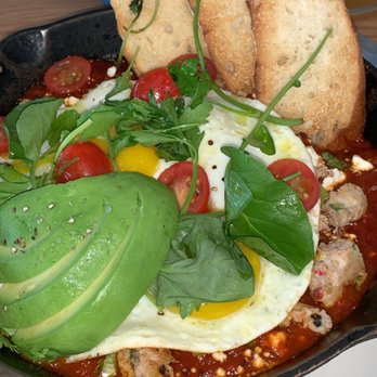 Prep & Pastry - Harissa Shakshouka* roasted red pepper sauce, sunny side up eggs, marinated olives and feta, crispy baguettes - Breakfast & Brunch Near Me - Tucson, Arizona Prep & Pastry - Harissa Shakshouka* roasted red pepper sauce, sunny side up eggs, marinated olives and feta, crispy baguettes - Breakfast & Brunch Near Me - Tucson, Arizona