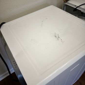 Caniff Solutions - Damaged dryer - Movers Near Me