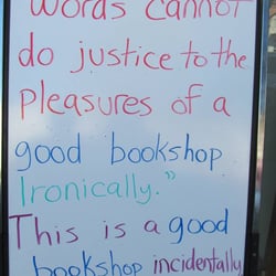 Dogwood Books - White board sign outside Dogwood Books.