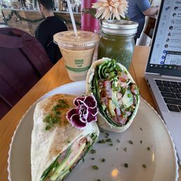 Smoked salmon wrap, green kale juice, ice Caffe Latte.