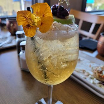 Stillhouse Restaurant - a glass of wine with a flower on top - Southern Near Me - Woodbury, Tennessee Stillhouse Restaurant - a glass of wine with a flower on top - Southern Near Me - Woodbury, Tennessee