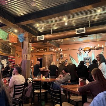 Taqueria Outlaw - Pretty much the whole dining area. Cute old west decor and art. - Mexican Near Me - Bisbee, Arizona Taqueria Outlaw - Pretty much the whole dining area. Cute old west decor and art. - Mexican Near Me - Bisbee, Arizona