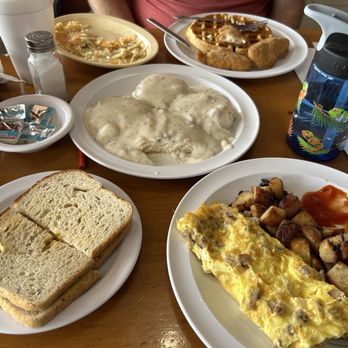 Sally’s Diner - This is the full order of biscuits and gravy, the sausage and cheese omelette with home fries - Breakfast & Brunch Near Me - Longwood, Florida Sally’s Diner - This is the full order of biscuits and gravy, the sausage and cheese omelette with home fries - Breakfast & Brunch Near Me - Longwood, Florida