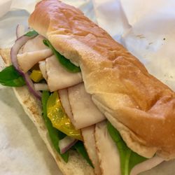 6" turkey w/spinach, mustard, banana peps, onion & black olives