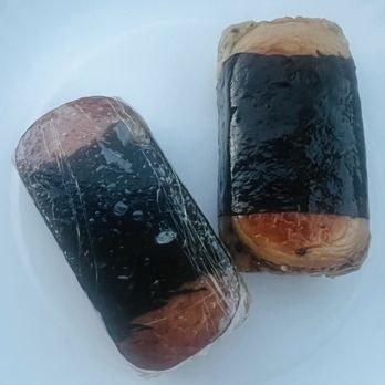 Honu Hawaiian BBQ - Spam Musubi. Has furikake and sesame oil finish. - Hawaiian Near Me - Rowland Heights, California Honu Hawaiian BBQ - Spam Musubi. Has furikake and sesame oil finish. - Hawaiian Near Me - Rowland Heights, California