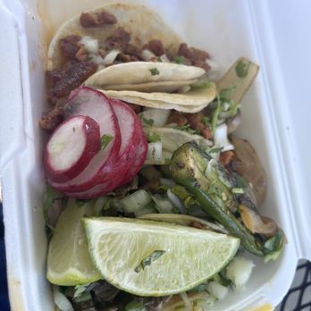 I Love Tacos - Two tacos Al Pastor and two Carne Asada tacos services with lime, radish and a grilled jalapeño. - Food Trucks Near Me - Tacoma, Washington