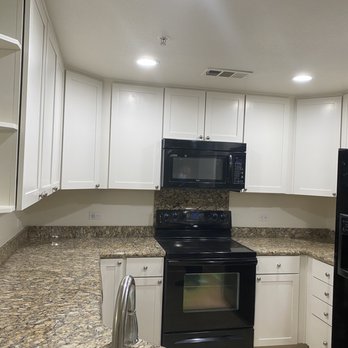PTR Remodeling Services - a kitchen with black appliances - General Contractors Near Me PTR Remodeling Services - a kitchen with black appliances - General Contractors Near Me