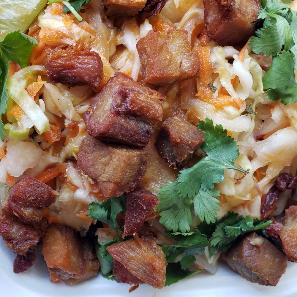 Walking Spanish - Loaded Yucca - yucca, curtido, salsa roja, crispy pork belly - Salvadoran Near Me - West Hollywood, California
