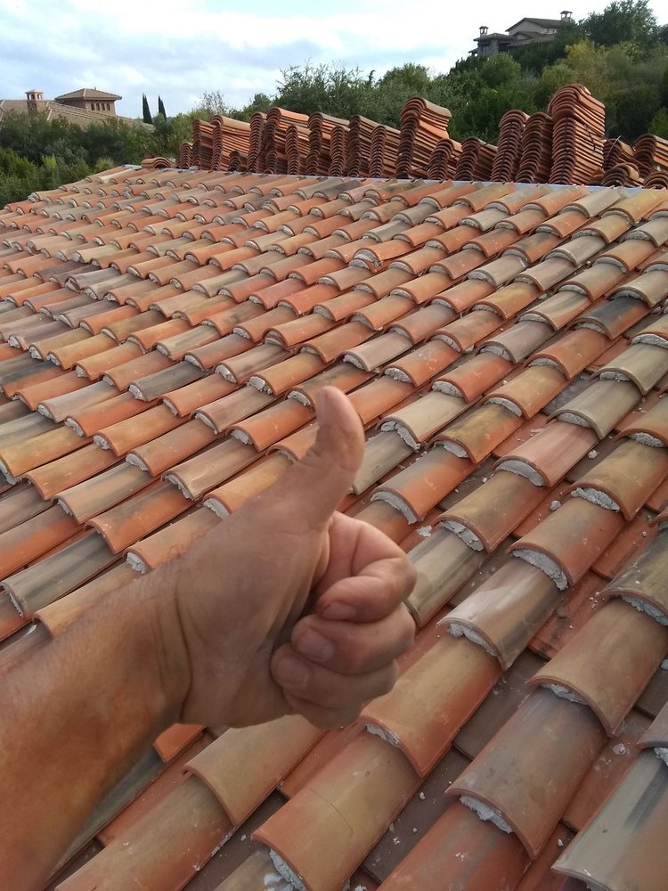 Slide of Camacho Roofing Construction