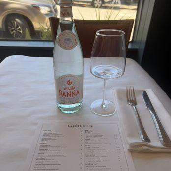 La Cote Bleue - Basic table set when you first walk in - Modern European Near Me - Pacific Grove, California