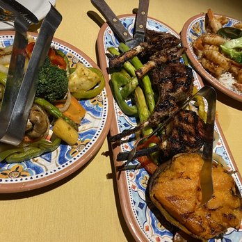 Cafe Izmir - two plates of food on a table - Middle Eastern Near Me - Dallas, Texas Cafe Izmir - two plates of food on a table - Middle Eastern Near Me - Dallas, Texas