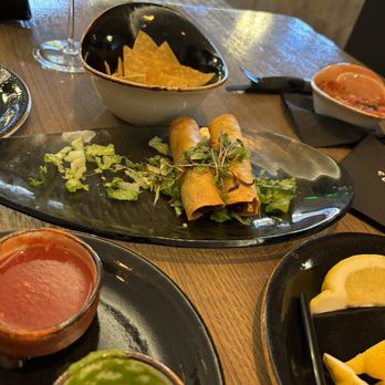 Caló Kitchen + Tequila - Chicken taquitos - Cocktail Bars Near Me - Costa Mesa, California Caló Kitchen + Tequila - Chicken taquitos - Cocktail Bars Near Me - Costa Mesa, California