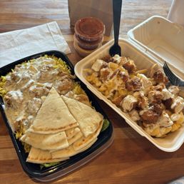 Chicken rice bowl with wise sauce and pita bread   Dirty Mac and chicken bowl  Fire sauce and boom boom sauce on the side