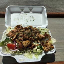 a chicken salad in a styrofoam container