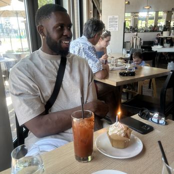The Bindery - My husband and the cute cupcake/candle they brought out for his birthday! Also featuring the mezcal bloody maria - New American Near Me - Denver, Colorado The Bindery - My husband and the cute cupcake/candle they brought out for his birthday! Also featuring the mezcal bloody maria - New American Near Me - Denver, Colorado