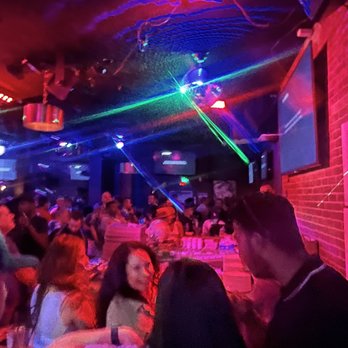 Flicks - a crowd of people at a party - Gay Bars Near Me - San Diego, California
