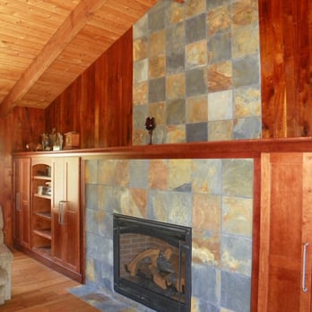 Tall Tree Remodeling - a fireplace in a living room - General Contractors Near Me Tall Tree Remodeling - a fireplace in a living room - General Contractors Near Me