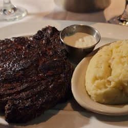 B Christopher's - The Cajun blackened rib eye is huge and melts in your mouth.