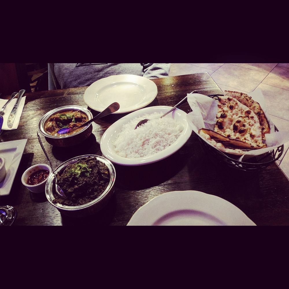 Nawab - Lamb Gosht in the front, Chicken Tikka Masala behind, Basmati and Garlic Naan - Indian Near Me - Yonkers, New York Nawab - Lamb Gosht in the front, Chicken Tikka Masala behind, Basmati and Garlic Naan - Indian Near Me - Yonkers, New York