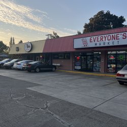Market attached to a neighborhood pizza joint on a Friday evening at 7 PM