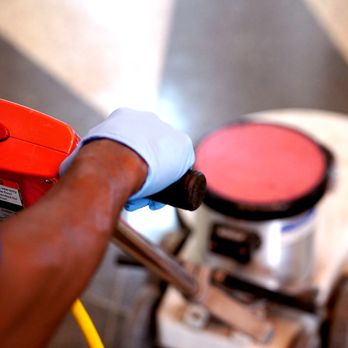 FNBC - a person using a machine to clean a floor - Office Cleaning Near Me - New York, New York FNBC - a person using a machine to clean a floor - Office Cleaning Near Me - New York, New York