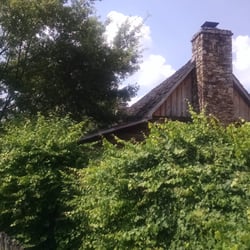 Chief White Path's Cabin - Street level.   Obscured by trees with that annoying building in the background .