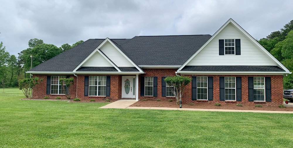 Slide of Hayman's Roofing