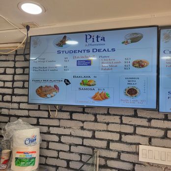 Pita and Hummus - a menu on the wall - Middle Eastern Near Me - Toronto, Ontario
