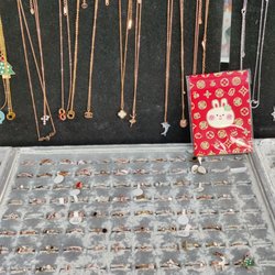 Judy Shop - Necklaces, rings, and red paper envelopes