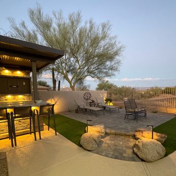 Gardens by Chilo & Susanna - Completed job, raised sitting deck with artificial turf and pavers, and the lighting tied it all together! Happy client! - Landscaping Near Me - Phoenix, Arizona Gardens by Chilo & Susanna - Completed job, raised sitting deck with artificial turf and pavers, and the lighting tied it all together! Happy client! - Landscaping Near Me - Phoenix, Arizona