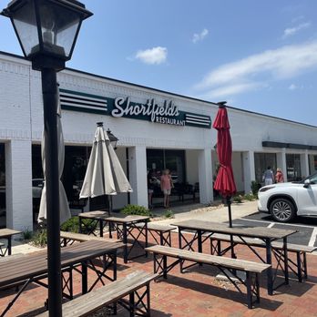 Shortfields - the outside of a restaurant with tables and umbrellas - New American Near Me - Simpsonville, South Carolina Shortfields - the outside of a restaurant with tables and umbrellas - New American Near Me - Simpsonville, South Carolina