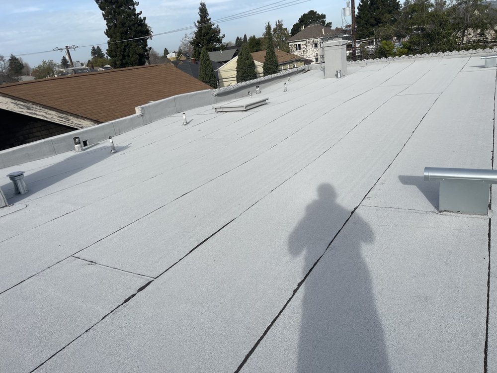 Slide of Fili's Roofing